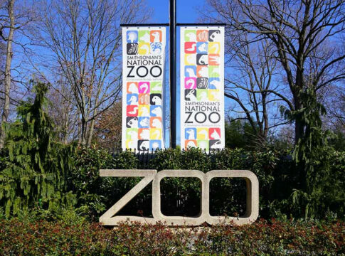 Smithsonians National Zoo entrance with colorful banners.