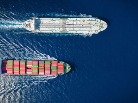 Two cargo ships navigating through the ocean