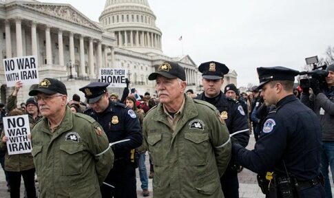 Veterans being arrested during a protest outside the Capitol building